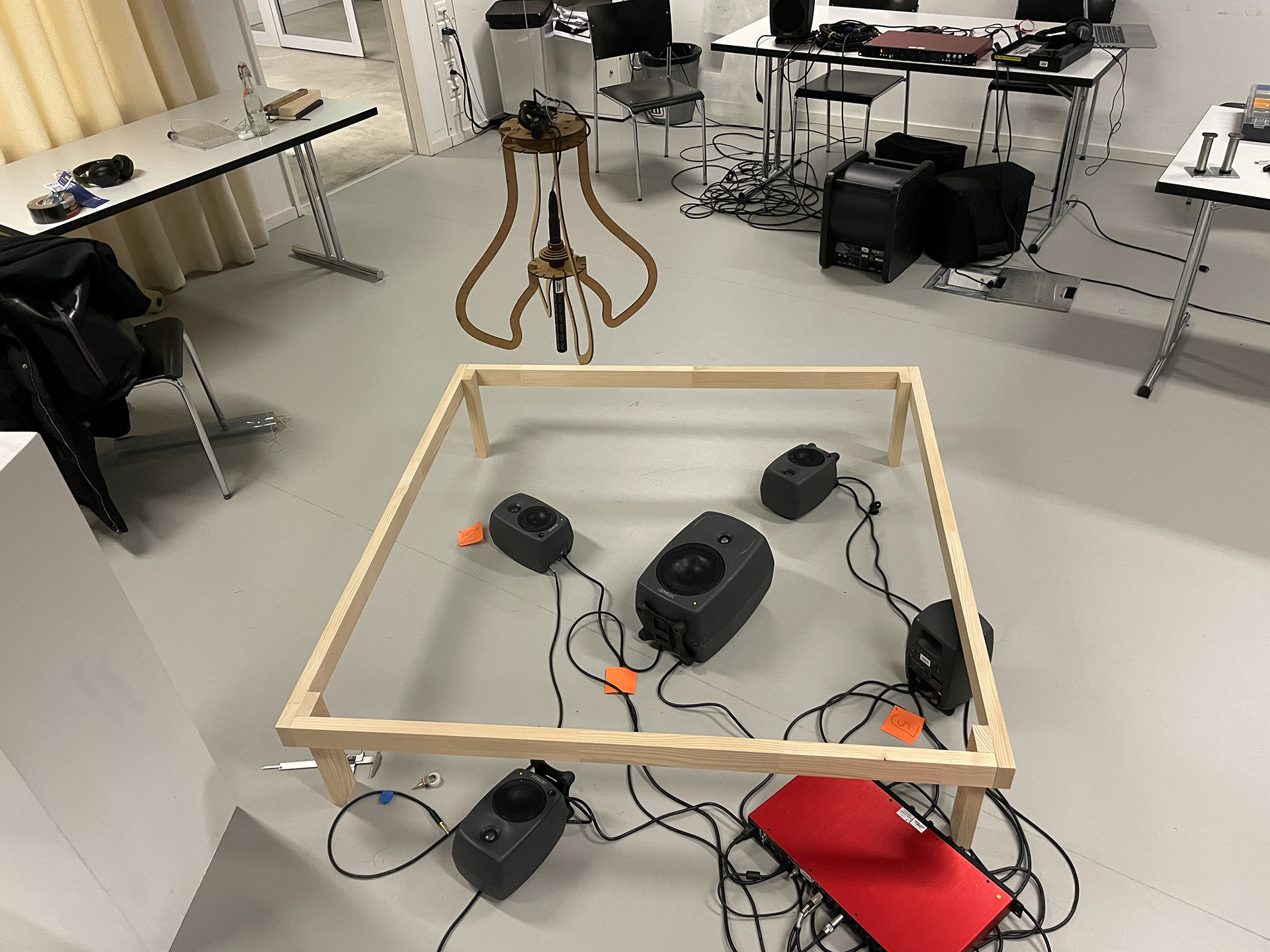Echoes in Space — workshop setup with the speaker array and pendulum during development