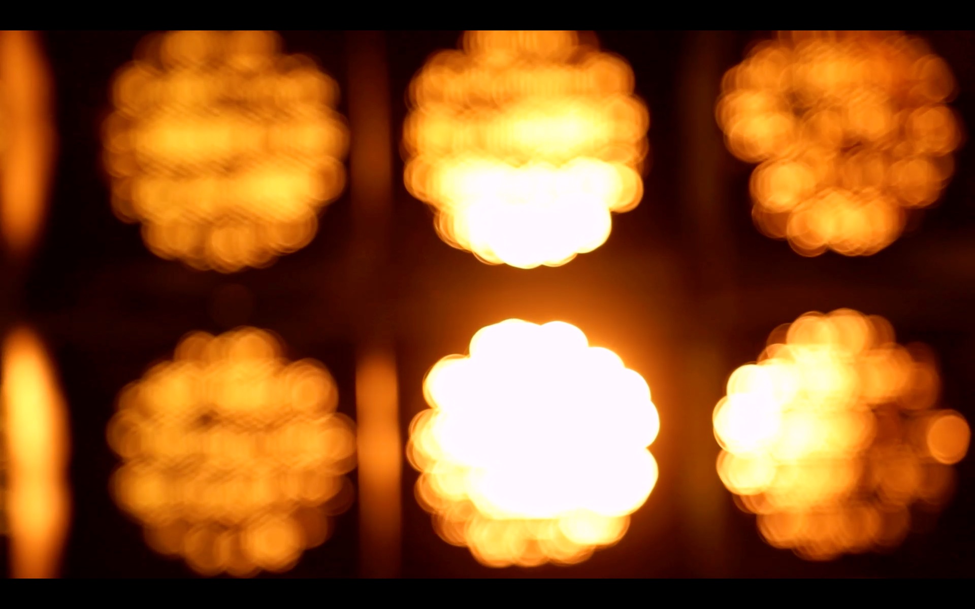MEMENTO — glowing light cells of the installation in soft focus