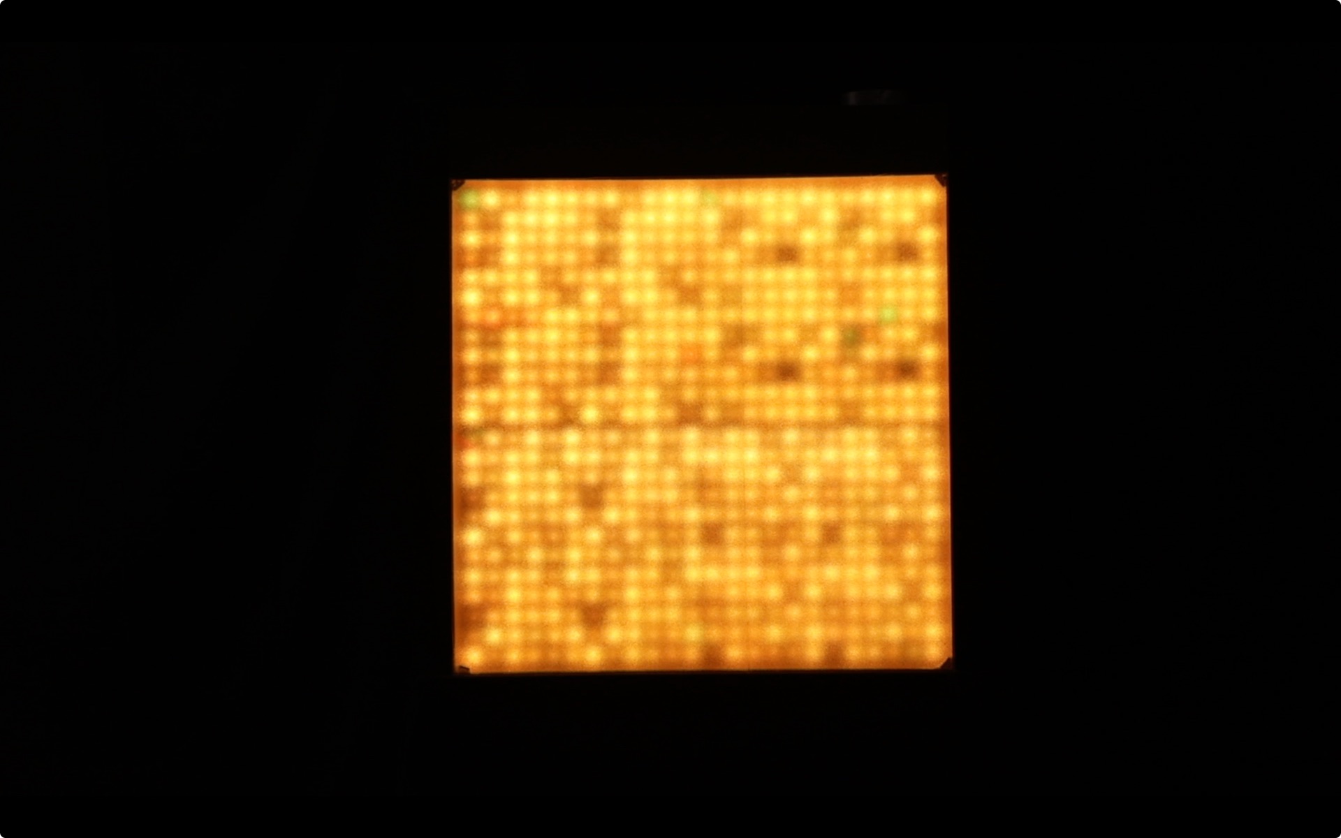 MEMENTO — the glowing pixel panel lit up while phones are plugged in